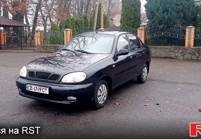 Черный Дэу Ланос, объемом двигателя 1.5 л и пробегом 230 тыс. км за 2350 $, фото 1 на Automoto.ua