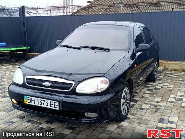 Черный Дэу Ланос, объемом двигателя 1.5 л и пробегом 222 тыс. км за 1650 $, фото 1 на Automoto.ua