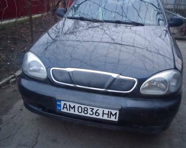 Черный Дэу Ланос, объемом двигателя 1.5 л и пробегом 275 тыс. км за 1690 $, фото 1 на Automoto.ua