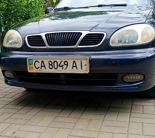 Черный Дэу Ланос, объемом двигателя 1.5 л и пробегом 262 тыс. км за 2200 $, фото 1 на Automoto.ua