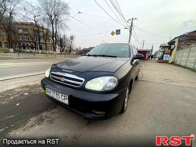 Черный Дэу Ланос, объемом двигателя 1.5 л и пробегом 220 тыс. км за 1350 $, фото 1 на Automoto.ua