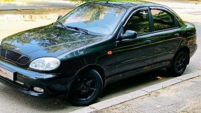 Черный Дэу Ланос, объемом двигателя 1.5 л и пробегом 144 тыс. км за 3800 $, фото 1 на Automoto.ua