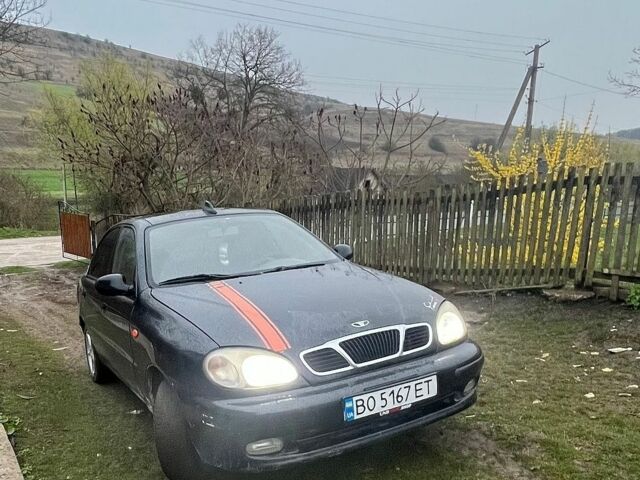 Черный Дэу Ланос, объемом двигателя 1.5 л и пробегом 237 тыс. км за 1600 $, фото 1 на Automoto.ua