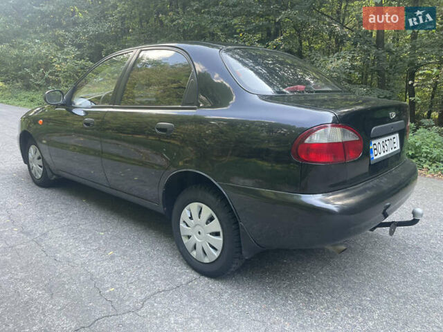 Чорний Деу Ланос, об'ємом двигуна 1.5 л та пробігом 157 тис. км за 2350 $, фото 1 на Automoto.ua