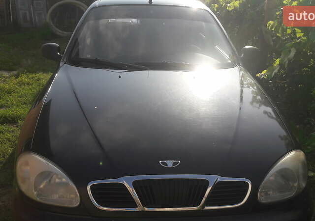 Черный Дэу Ланос, объемом двигателя 1.4 л и пробегом 175 тыс. км за 2500 $, фото 1 на Automoto.ua