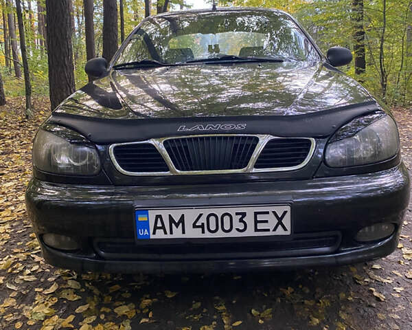 Черный Дэу Ланос, объемом двигателя 1.5 л и пробегом 210 тыс. км за 2700 $, фото 1 на Automoto.ua