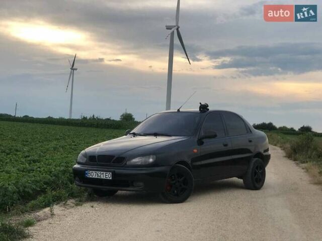 Черный Дэу Ланос, объемом двигателя 1.6 л и пробегом 273 тыс. км за 2800 $, фото 1 на Automoto.ua