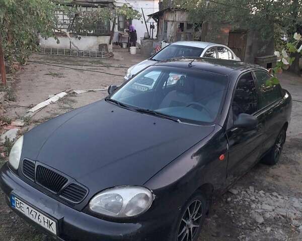 Черный Дэу Ланос, объемом двигателя 1.5 л и пробегом 180 тыс. км за 2250 $, фото 1 на Automoto.ua