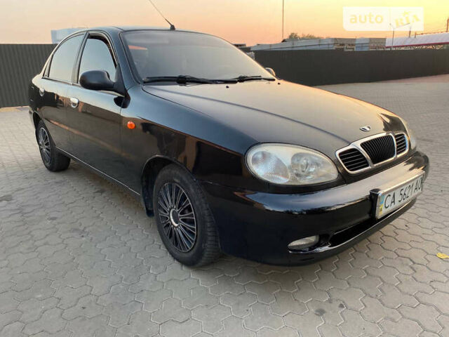 Черный Дэу Ланос, объемом двигателя 1.6 л и пробегом 260 тыс. км за 2200 $, фото 1 на Automoto.ua