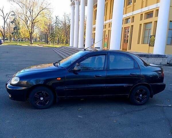 Черный Дэу Ланос, объемом двигателя 1.5 л и пробегом 365 тыс. км за 2000 $, фото 1 на Automoto.ua