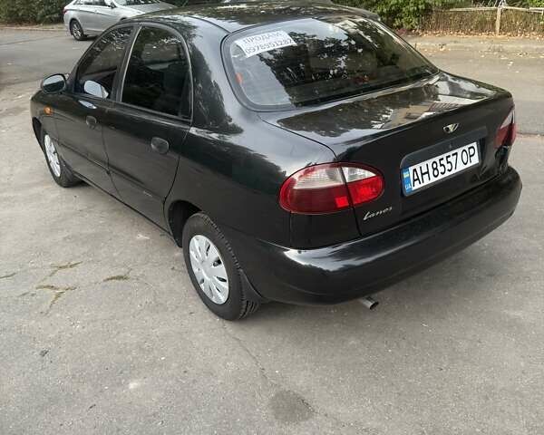Черный Дэу Ланос, объемом двигателя 1.5 л и пробегом 99 тыс. км за 1650 $, фото 1 на Automoto.ua