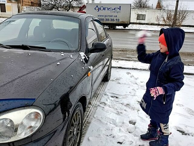 Черный Дэу Ланос, объемом двигателя 1.5 л и пробегом 190 тыс. км за 2550 $, фото 1 на Automoto.ua