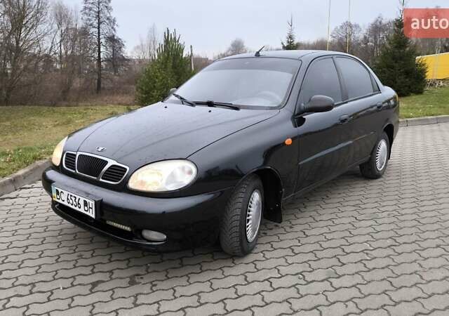 Черный Дэу Ланос, объемом двигателя 1.39 л и пробегом 213 тыс. км за 2300 $, фото 1 на Automoto.ua