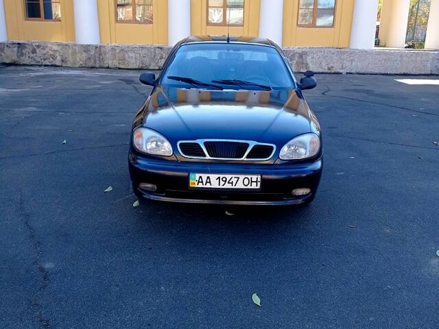 Черный Дэу Ланос, объемом двигателя 1.5 л и пробегом 365 тыс. км за 2000 $, фото 1 на Automoto.ua