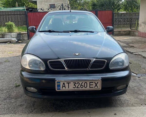 Черный Дэу Ланос, объемом двигателя 1.5 л и пробегом 226 тыс. км за 2000 $, фото 1 на Automoto.ua
