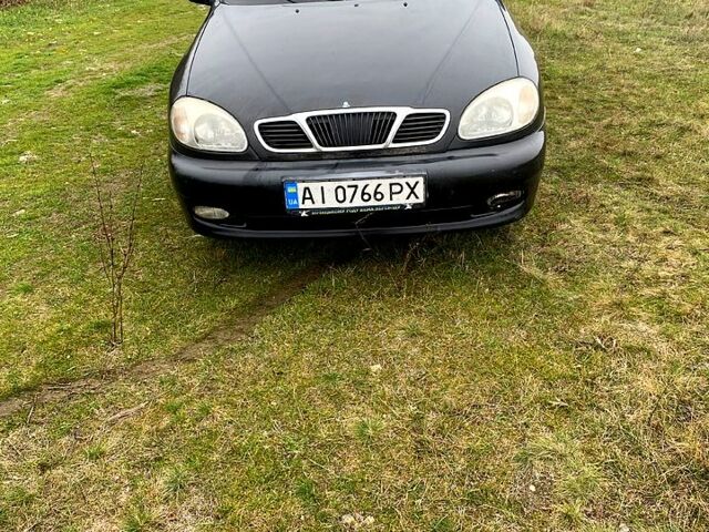 Чорний Деу Ланос, об'ємом двигуна 1.5 л та пробігом 256 тис. км за 1100 $, фото 1 на Automoto.ua