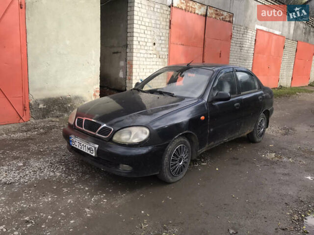 Черный Дэу Ланос, объемом двигателя 1.5 л и пробегом 150 тыс. км за 950 $, фото 1 на Automoto.ua