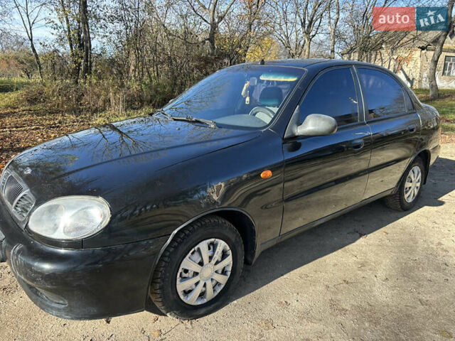 Черный Дэу Ланос, объемом двигателя 1.5 л и пробегом 152 тыс. км за 1550 $, фото 1 на Automoto.ua