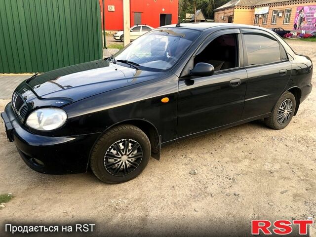 Черный Дэу Ланос, объемом двигателя 1.4 л и пробегом 50 тыс. км за 2250 $, фото 1 на Automoto.ua