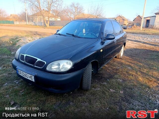 Черный Дэу Ланос, объемом двигателя 1.4 л и пробегом 222 тыс. км за 1790 $, фото 1 на Automoto.ua