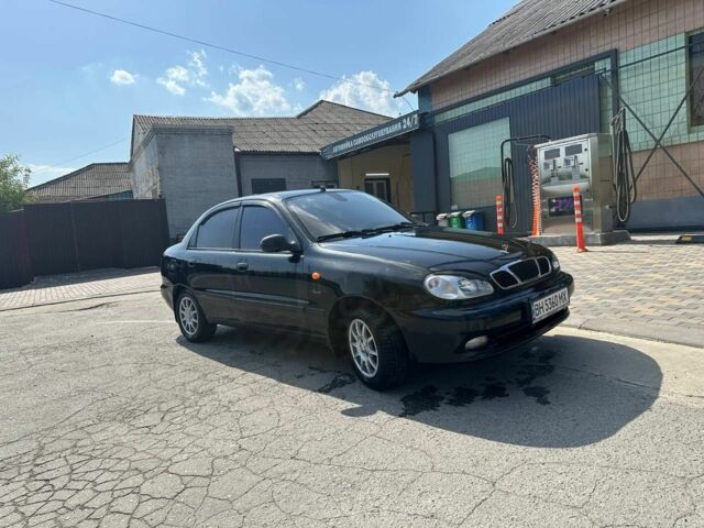 Черный Дэу Ланос, объемом двигателя 1.5 л и пробегом 130 тыс. км за 2700 $, фото 1 на Automoto.ua