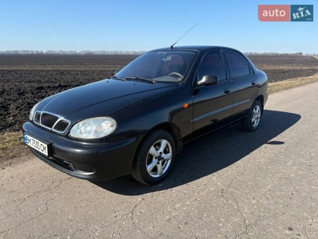 Черный Дэу Ланос, объемом двигателя 1.5 л и пробегом 205 тыс. км за 2100 $, фото 1 на Automoto.ua