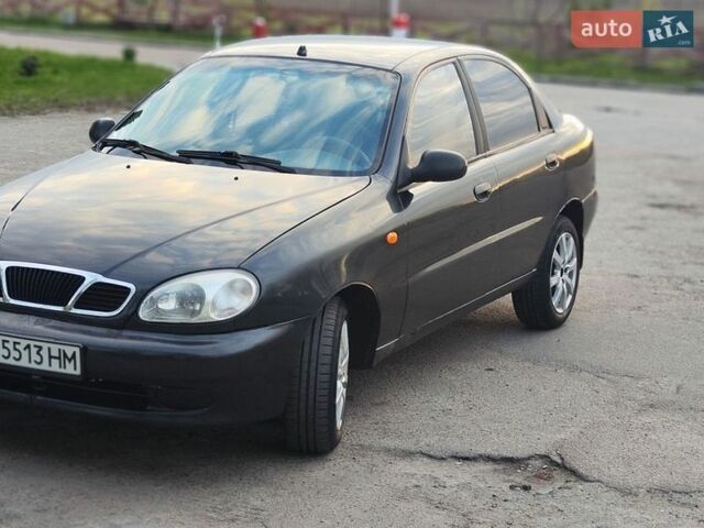 Черный Дэу Ланос, объемом двигателя 1.5 л и пробегом 160 тыс. км за 1900 $, фото 1 на Automoto.ua