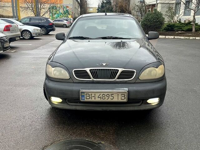 Чорний Деу Ланос, об'ємом двигуна 1.5 л та пробігом 137 тис. км за 2350 $, фото 1 на Automoto.ua