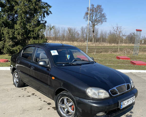 Черный Дэу Ланос, объемом двигателя 1.5 л и пробегом 204 тыс. км за 2000 $, фото 1 на Automoto.ua
