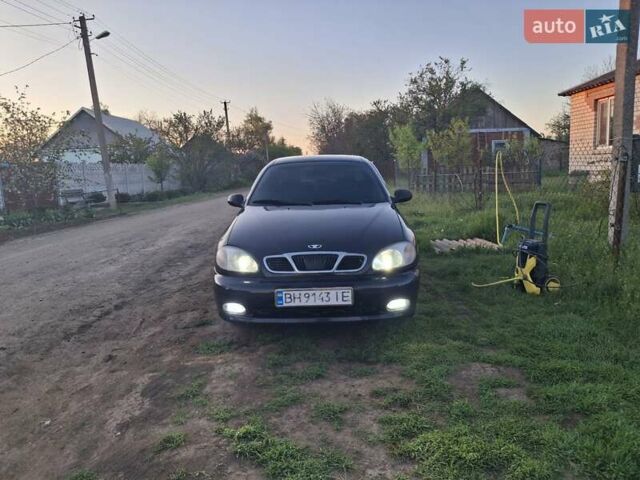 Черный Дэу Ланос, объемом двигателя 1.5 л и пробегом 540 тыс. км за 2250 $, фото 1 на Automoto.ua