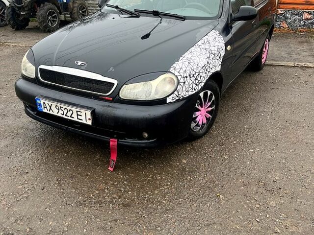 Черный Дэу Ланос, объемом двигателя 1.4 л и пробегом 202 тыс. км за 1400 $, фото 1 на Automoto.ua