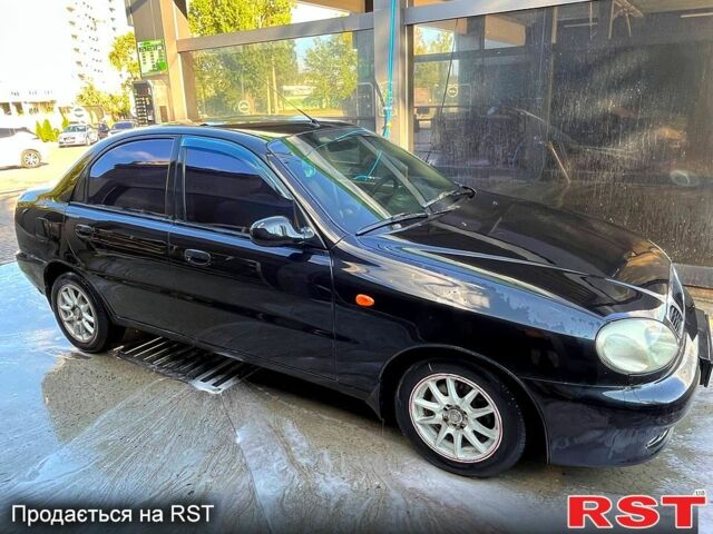 Чорний Деу Ланос, об'ємом двигуна 1.6 л та пробігом 260 тис. км за 2999 $, фото 1 на Automoto.ua