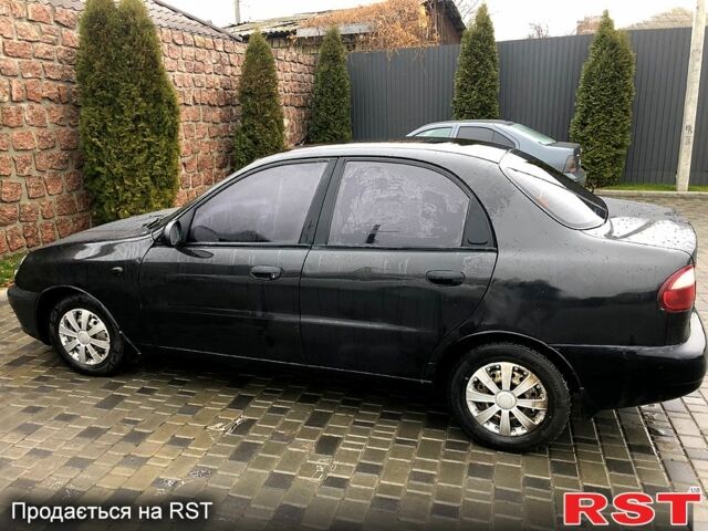 Чорний Деу Ланос, об'ємом двигуна 1.5 л та пробігом 198 тис. км за 1700 $, фото 1 на Automoto.ua