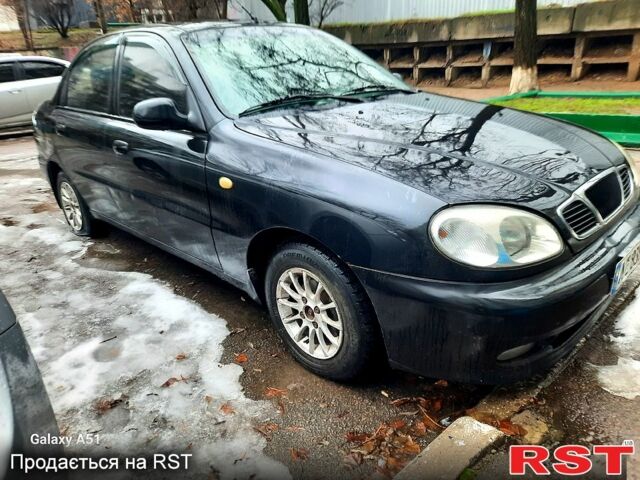 Черный Дэу Ланос, объемом двигателя 1.5 л и пробегом 212 тыс. км за 1250 $, фото 1 на Automoto.ua