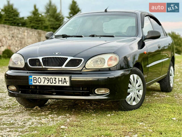 Черный Дэу Ланос, объемом двигателя 1.5 л и пробегом 230 тыс. км за 2600 $, фото 1 на Automoto.ua