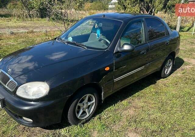 Чорний Деу Ланос, об'ємом двигуна 1.5 л та пробігом 235 тис. км за 2500 $, фото 1 на Automoto.ua