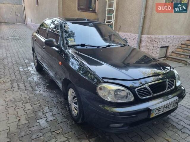 Черный Дэу Ланос, объемом двигателя 1.6 л и пробегом 139 тыс. км за 2350 $, фото 1 на Automoto.ua