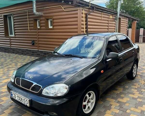 Чорний Деу Ланос, об'ємом двигуна 1.5 л та пробігом 152 тис. км за 2550 $, фото 1 на Automoto.ua