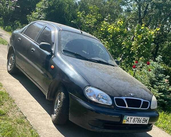 Черный Дэу Ланос, объемом двигателя 1.6 л и пробегом 156 тыс. км за 2300 $, фото 1 на Automoto.ua