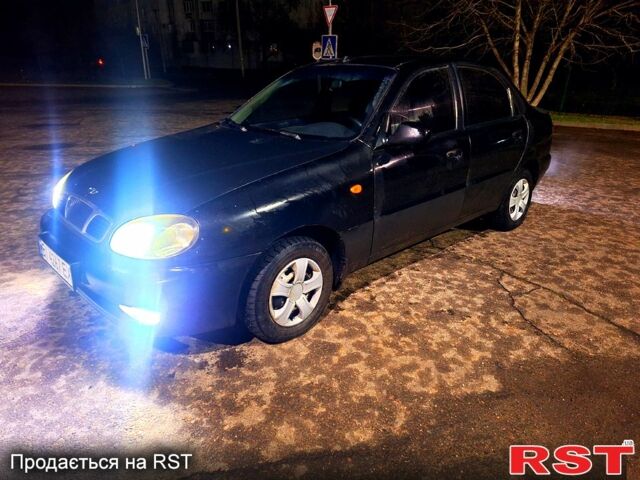 Чорний Деу Ланос, об'ємом двигуна 1.5 л та пробігом 270 тис. км за 1350 $, фото 1 на Automoto.ua