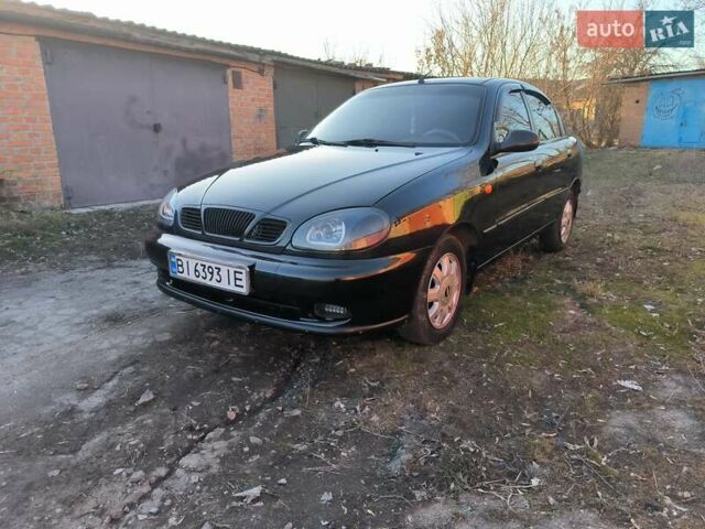 Чорний Деу Ланос, об'ємом двигуна 1.5 л та пробігом 195 тис. км за 3200 $, фото 1 на Automoto.ua