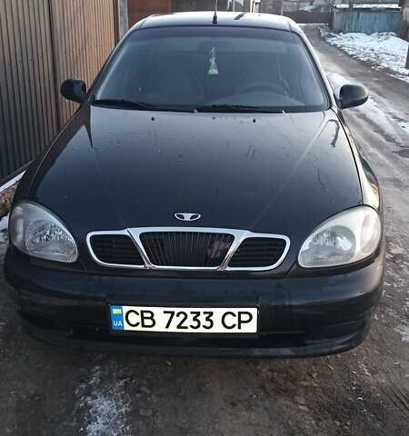 Черный Дэу Ланос, объемом двигателя 1.5 л и пробегом 222 тыс. км за 2350 $, фото 1 на Automoto.ua