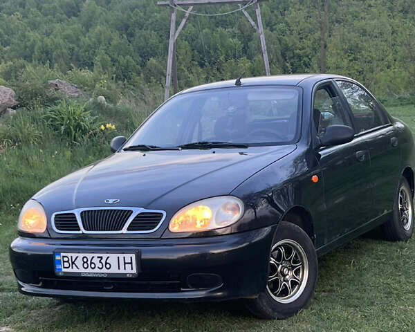 Чорний Деу Ланос, об'ємом двигуна 1.5 л та пробігом 162 тис. км за 2250 $, фото 1 на Automoto.ua