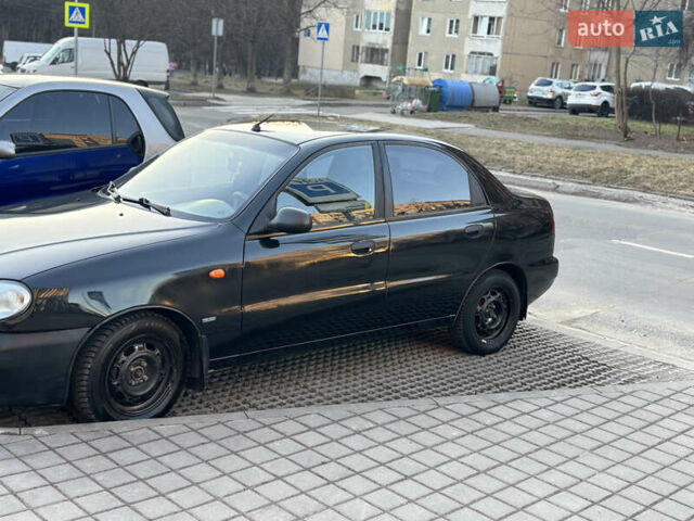 Черный Дэу Ланос, объемом двигателя 1.5 л и пробегом 313 тыс. км за 2400 $, фото 1 на Automoto.ua