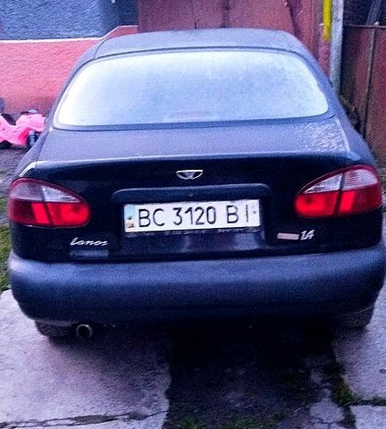 Черный Дэу Ланос, объемом двигателя 1.4 л и пробегом 300 тыс. км за 1500 $, фото 1 на Automoto.ua