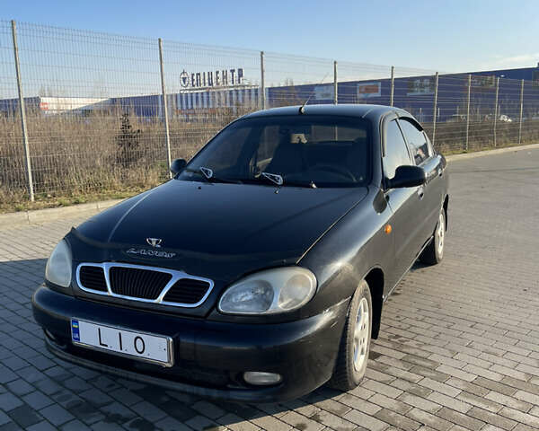 Черный Дэу Ланос, объемом двигателя 1.4 л и пробегом 177 тыс. км за 1750 $, фото 1 на Automoto.ua