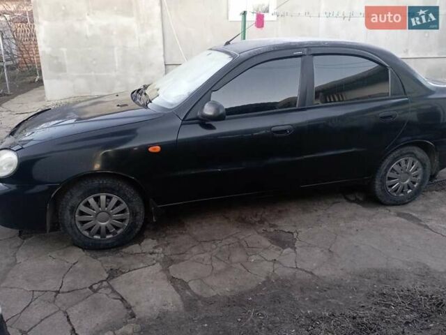 Чорний Деу Ланос, об'ємом двигуна 1.5 л та пробігом 184 тис. км за 3000 $, фото 1 на Automoto.ua