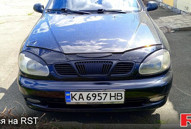 Чорний Деу Ланос, об'ємом двигуна 1.4 л та пробігом 149 тис. км за 2300 $, фото 1 на Automoto.ua