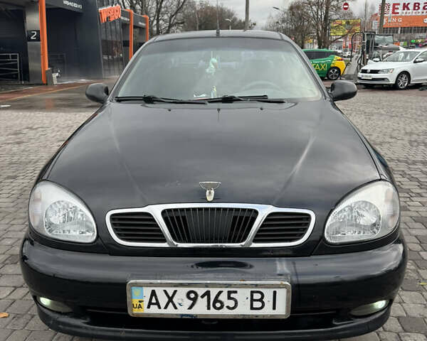 Черный Дэу Ланос, объемом двигателя 1.5 л и пробегом 142 тыс. км за 2799 $, фото 1 на Automoto.ua