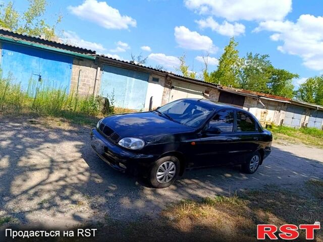 Черный Дэу Ланос, объемом двигателя 1.6 л и пробегом 104 тыс. км за 3000 $, фото 1 на Automoto.ua